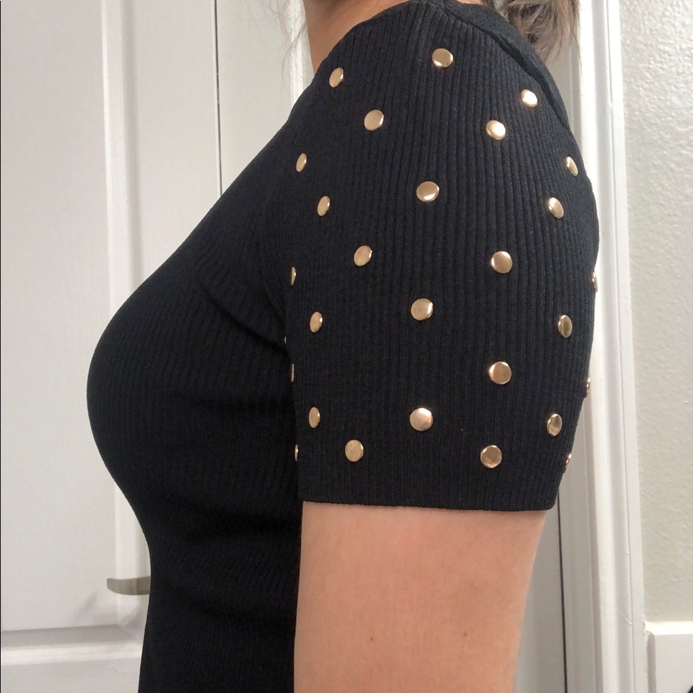Knit top with gold button sleeve detail